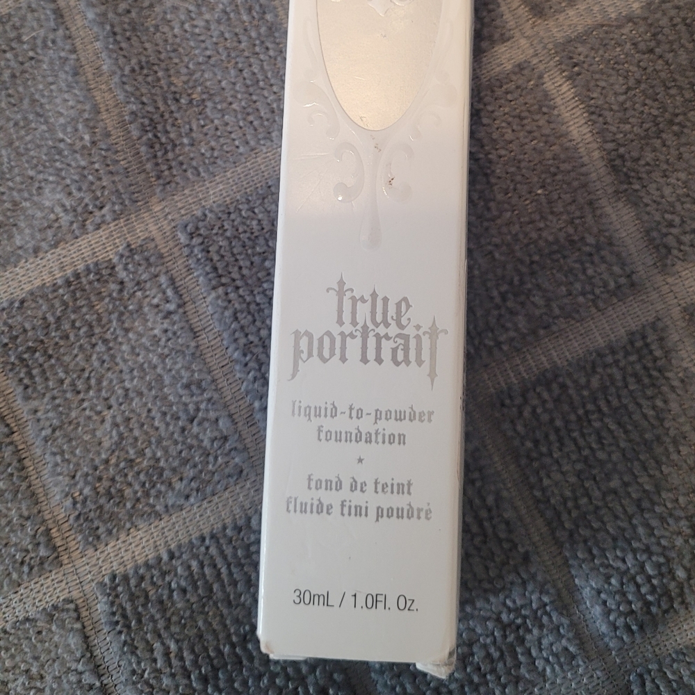 1 bottle Kat Von D True Portrait liquid to powder foundation